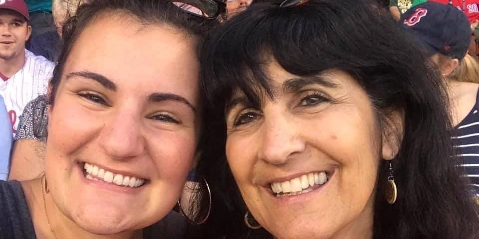 Linda smiling with a friend